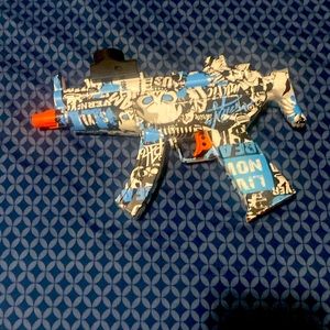 All new blue, black, and white gel blaster | Includes ammo, bottle, charger